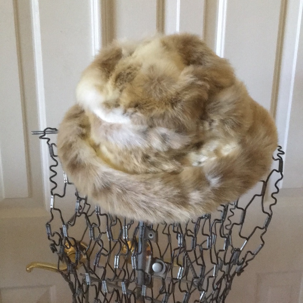 Pale faux fur hat